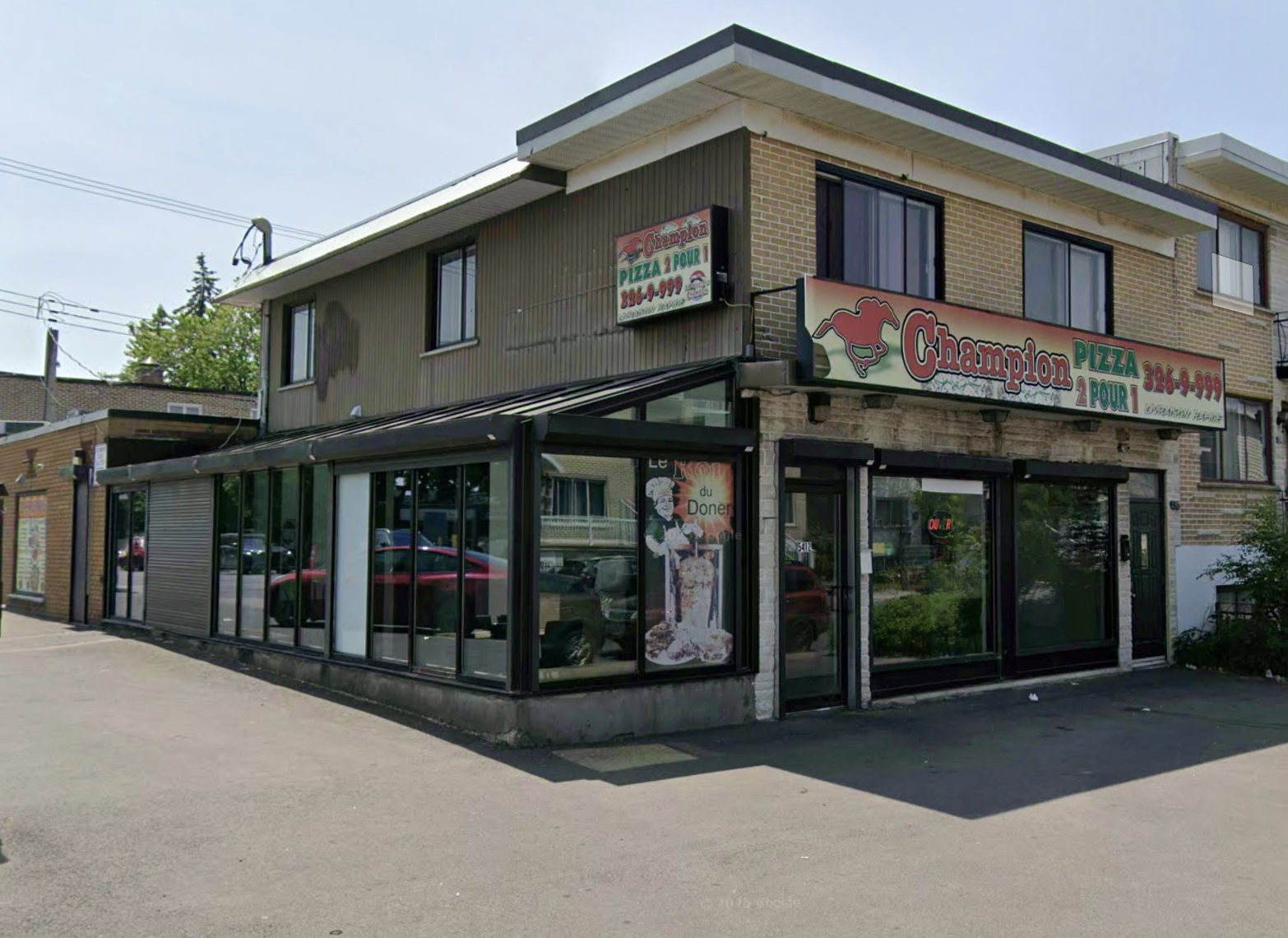 Façade du restaurant Champion Pizza, rue de Charleroi à Montréal-Nord
